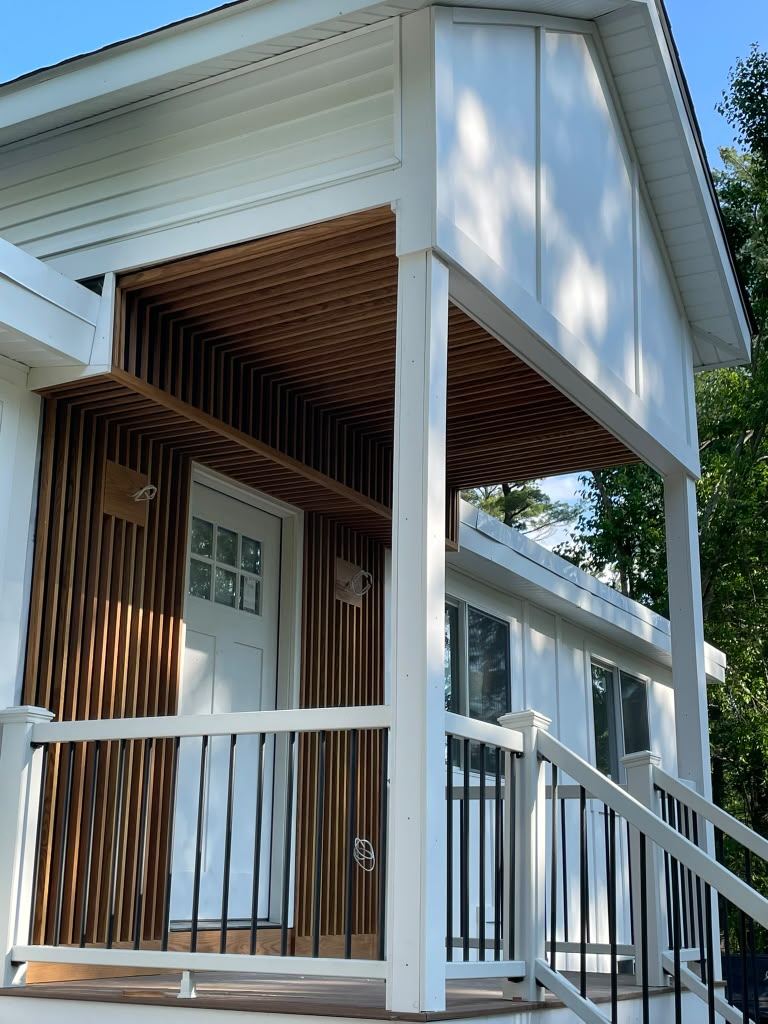 Exterior porch with cedar slat ceiling and wall detail