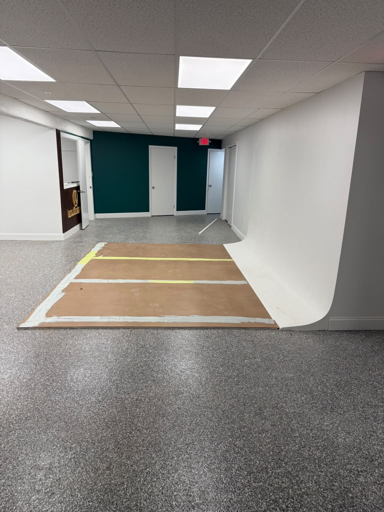 Commercial interior remodel with custom curved feature wall